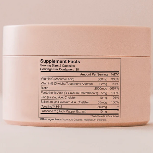 Supplement Facts on jar: serving size 2 capsules; Vitamin C 300mg, Biotin 2000mcg, Cynatine HNS 500mg.