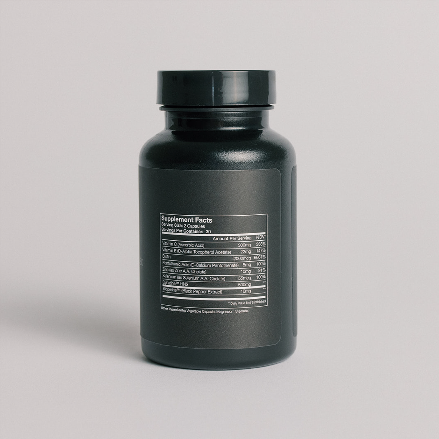 Ingredient panel on a Black bottle of HAIRLOVE hair growth complex for men, daily hair vitamin