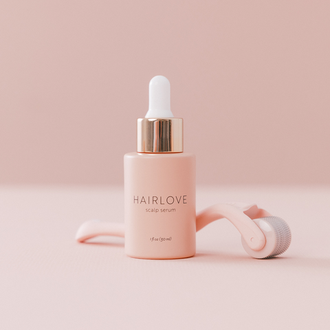HAIRLOVE scalp serum 1 fl oz (30 ml) bottle with pink derma roller