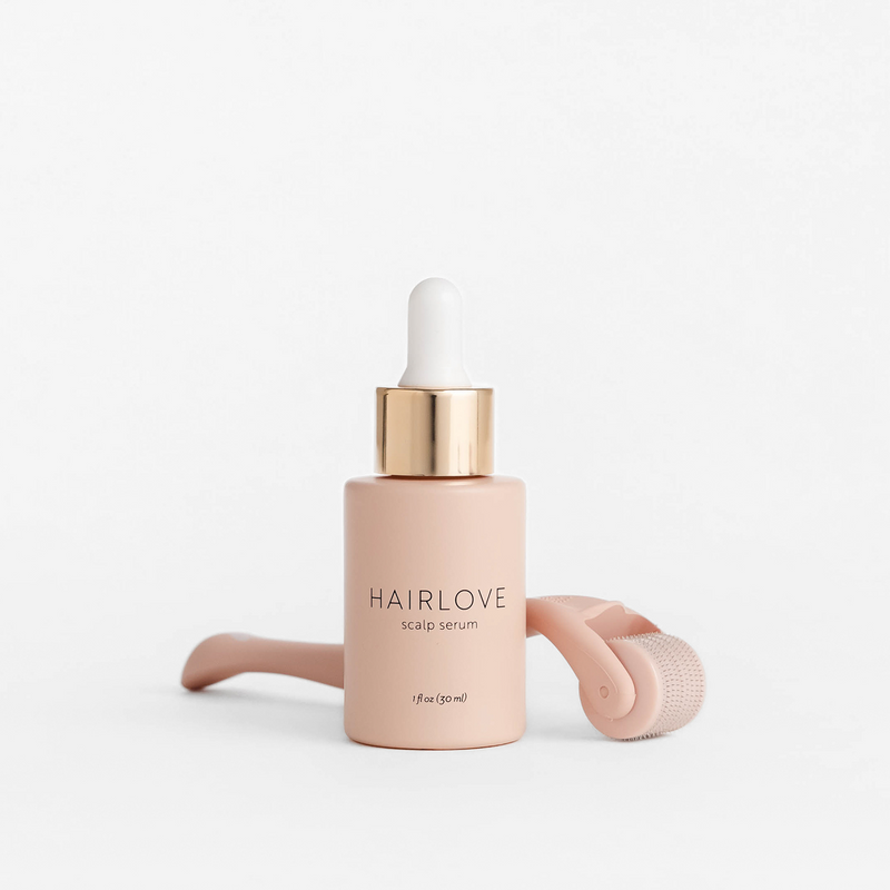 Front view of Scalp Activation Bundle showcasing scalp serum and derma roller on a white background
